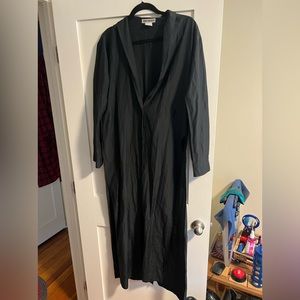 Issey Miyake Women’s long sleeve button down cardigan.